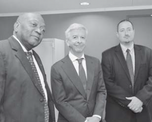 Dutch Minister of Home Affairs and Kingdom Relations Ronald Plasterk (centre) with Commissioners Reginald Zaandam of St. Eustatius (left) and Bruce Zagers of Saba at a reception on Monday to kick off the Caribbean Netherlands Week in The Hague. (Suzanne Koelega photo)