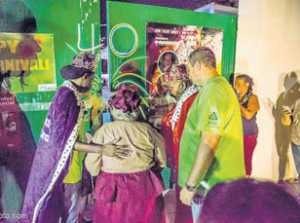 From left: 2015 Road March King Cirilio “Daddy Slim” Martin, Carmen Simmons, Culture Commissioner Bruce Zagers and Bob “The Man Bob” Morgan open the gate to Festival Village, marking the official opening of Saba Carnival Monday night. (STK photo)