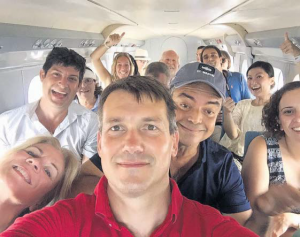 Aviation journalist Adam Twidell takes a selfie as the international journalists brought in by Princess Juliana International Airport SXM approach Saba.