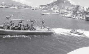 The Navy’s Fast Raiding Interception Special Forces (FRISC) towing the jet-ski to the Coast Guard substation in Simpson Bay.