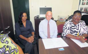 From left: Melissa Spanner, Chief Prosecutor Henry Hambeukers and Communication Advisor at Government Service Caribbean Netherlands RCN Alida Francis at the Prosecutor’s Office in Fort Oranje.