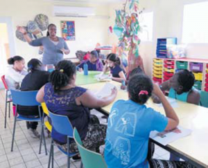 Lysanne Charles-Arrindell (standing) leading one of the Sister Talk workshops.