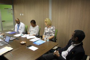 Director Rosalie Edelstein-Lopes from the GvP and transition coordinator Angela Dekker (second and third from left) receiving information from CXC (Caribbean Examination Council) representatives. 