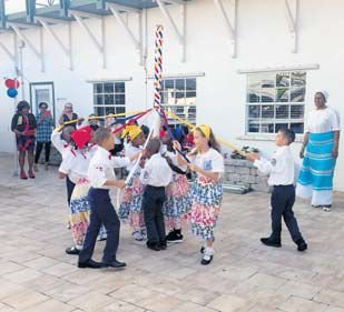 Dancing the Maypole.